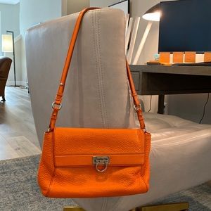 Salvatore Ferragamo Abbey orange (sunset) pebble leather purse